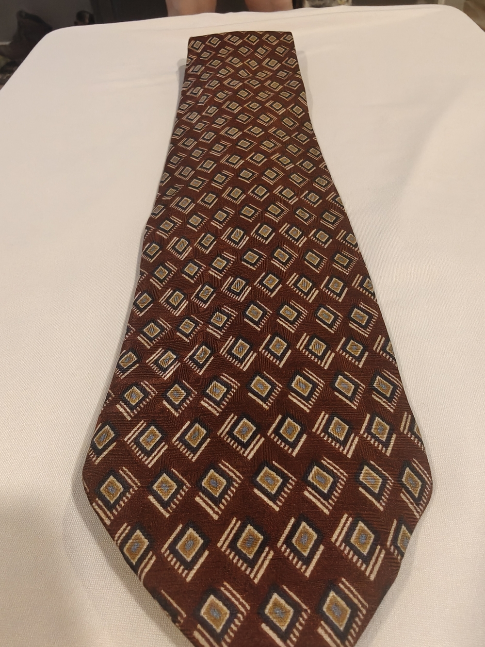 Men's Brown Geometric Pattern Tie with Blue and Cream Accents